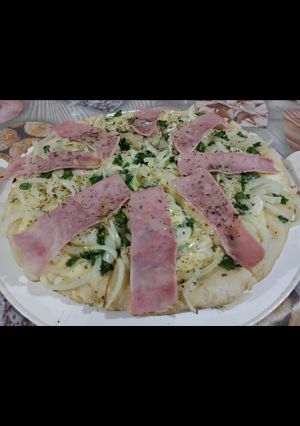 Una foto de Fugazzeta especial👌con Verdeo y Jamón.😍