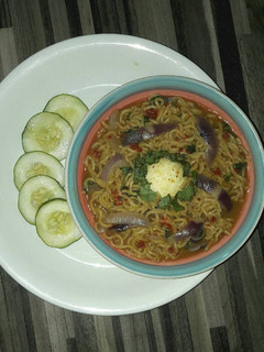 A picture of Indomie peppersoup and boiled egg.