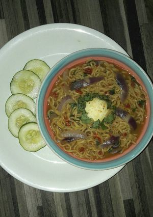 A picture of Indomie peppersoup and boiled egg.