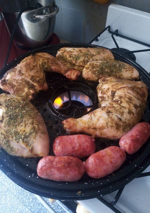 Una foto de Pollo a la parrigas