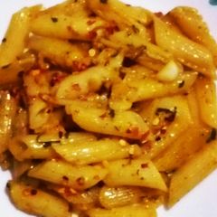A picture of Orangy penne pasta.