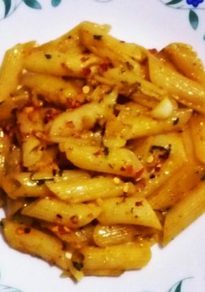 A picture of Orangy penne pasta.