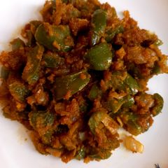 A picture of Capsicum with gram flour 🫑🫑🧅🧅.