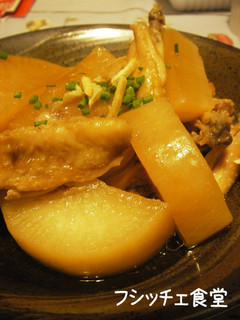 A picture of Simmered Daikon Radish and Chicken in a Pressure Cooker.