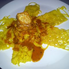 A picture of Roti Jala (Net Like Bread).
