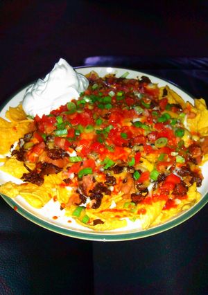 A picture of Carne asada nachos, cantina style.