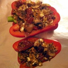 A picture of Mushroom, feta & tomato baked peppers.
