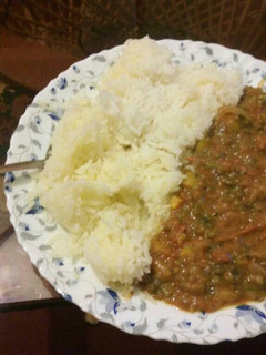 A picture of Margarine Rice & Spicy Green Grams (Ndengu).