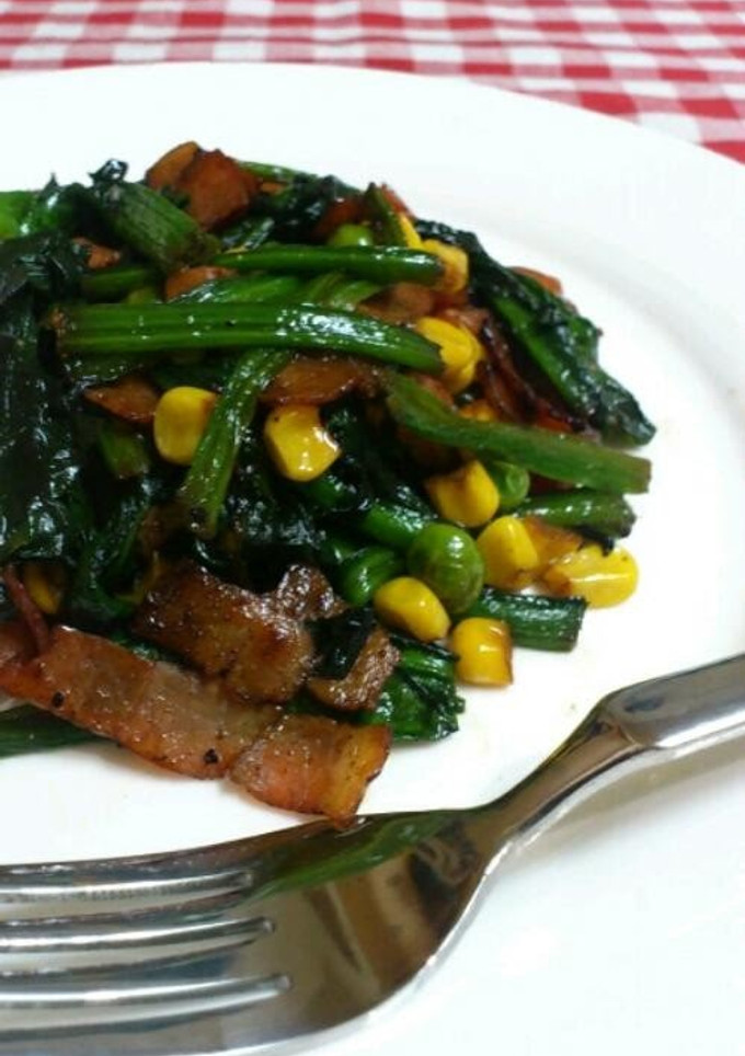 A picture of Butter-Sautéed Spinach with Caramelized Soy Sauce.