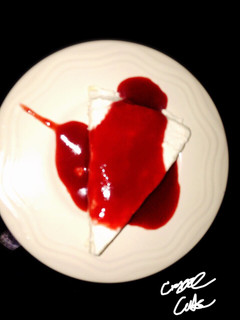A picture of Crepe Cake with Strawberry Sauce.
