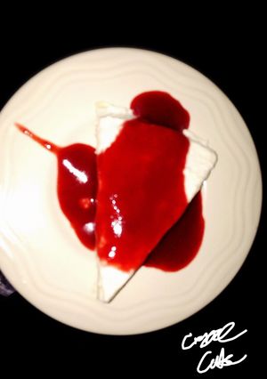 A picture of Crepe Cake with Strawberry Sauce.