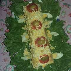 Una foto de Pionono de pollo, jamón y queso