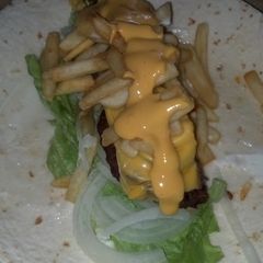 A picture of The everything cheeseburger wrap.