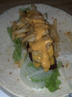 A picture of The everything cheeseburger wrap.