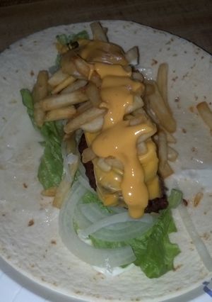 A picture of The everything cheeseburger wrap.