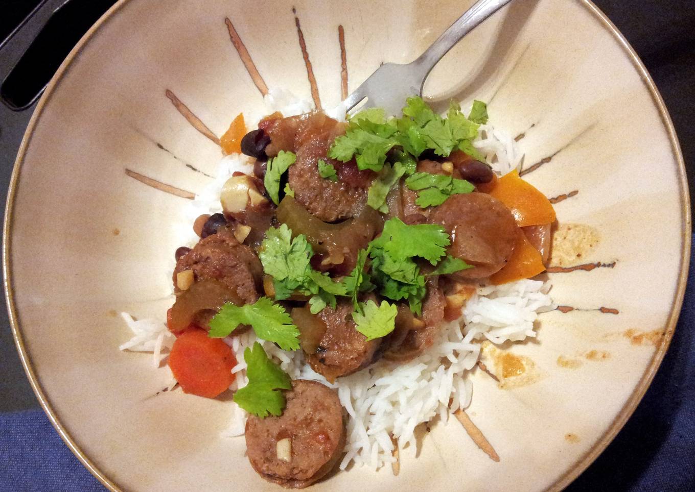 Chicken and pork sausage and beans.