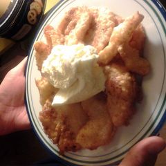A picture of "Apfelkuchen" GermanApples in viscous batter and vanila ice cream.such a nice German recipe!.