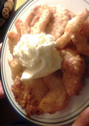 A picture of "Apfelkuchen" GermanApples in viscous batter and vanila ice cream.such a nice German recipe!.