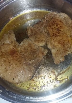 A picture of Seared stove top porkchops.