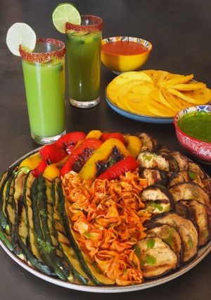 A picture of Vegetarian Grill with Mint Salsa Verde, Enchilada Sauce, and Agua de Pepino.