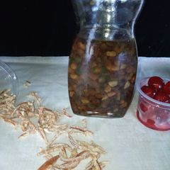 A picture of Soaking fruits for rich fruit cake.