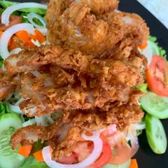 A picture of Chicken veggie salad.