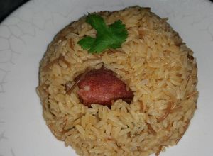 Una foto de Locrio de fideos y chuleta