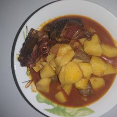 A picture of Potato porrage and fryed chicken#Kano golden apron#.