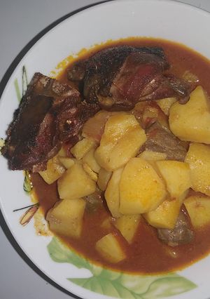 A picture of Potato porrage and fryed chicken#Kano golden apron#.