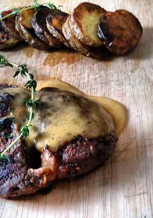 A picture of Ultimate steak with potatoes.