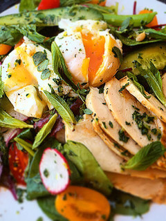 A picture of Poached Eggs with Herb Filled Salad & Gremolata.