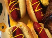 A picture of grill hot dogs