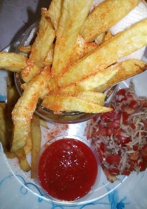 A picture of Homemade fries with Chia salad.
