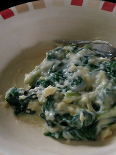 A picture of spinach in bechamel sauce.