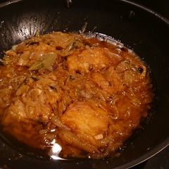 A picture of Cod Fried in Olive Oil and Onions.