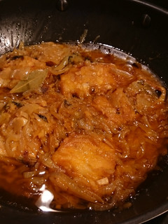 A picture of Cod Fried in Olive Oil and Onions.