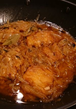 A picture of Cod Fried in Olive Oil and Onions.