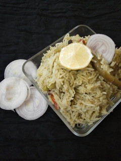 A picture of Palak peas pulao.