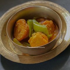 A picture of Ridge gourd curry with Lentil Dumplings.