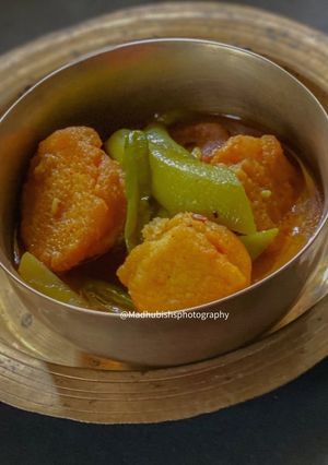 A picture of Ridge gourd curry with Lentil Dumplings.
