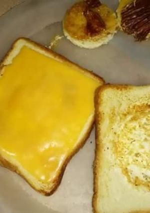 A picture of Grilled cheese and egg.