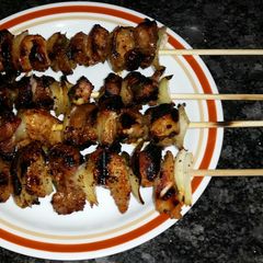 A picture of Onion & Orange kabobs.