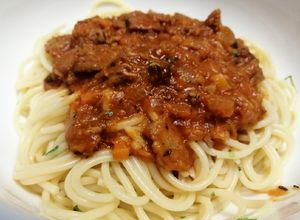 Una foto de Spaguettis en Carne Entomatada de Mantequilla