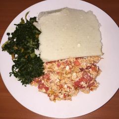 A picture of Ugali,Scrambled eggs and Steamed Spinach.