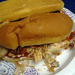 A picture of Leftover turkey sandwiches with spicy onions.