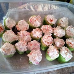 A picture of Cucumber stuffed with spicy crab.