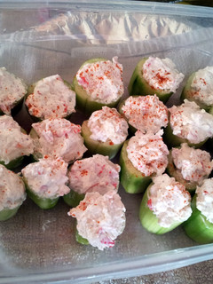 A picture of Cucumber stuffed with spicy crab.