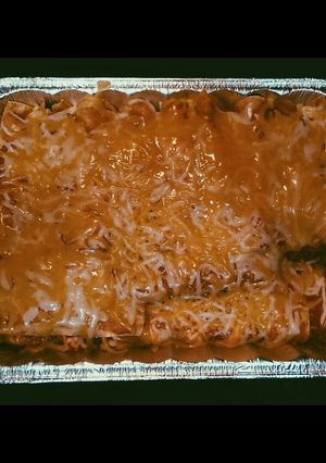 A picture of Cheesy enchiladas.