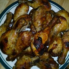 A picture of Honey glazed chicken drumsticks.