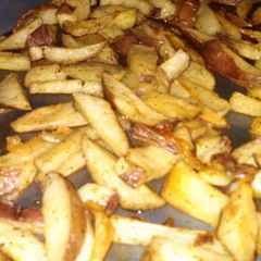 A picture of Seasoned baked French fries.